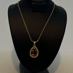 Radiant Gold Toned Teardrop Pendant Necklace
